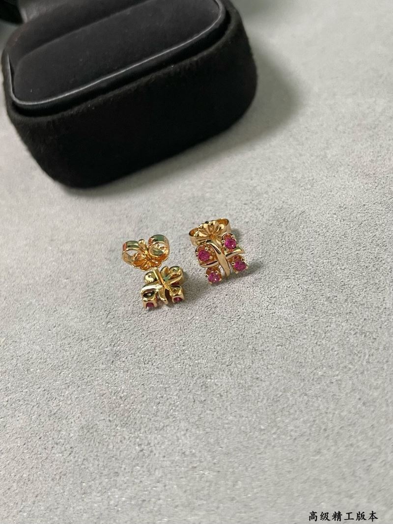 T*f*ny earrings